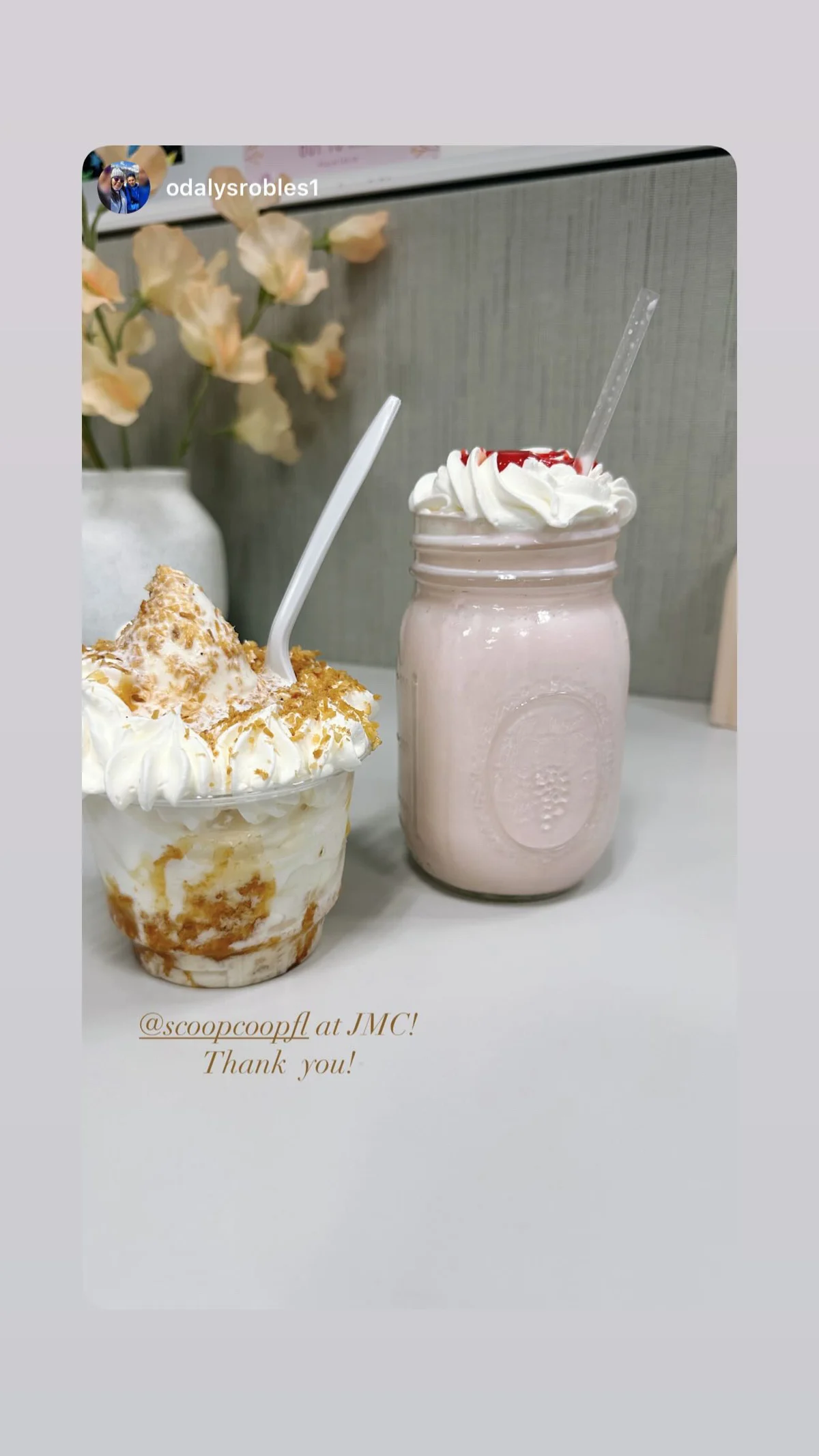 Toasted-coconut sundae and a strawberry milkshake side by side on a clean white table